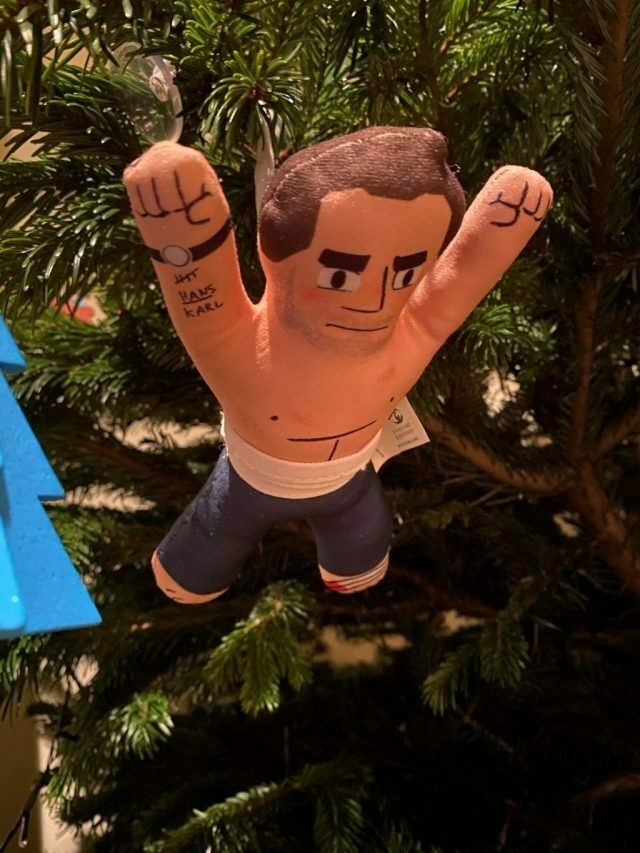 John McClane plushie toy jumping from the Christmas tree