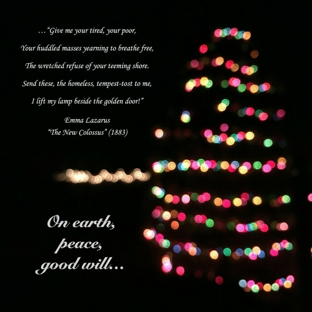 Holiday greetings featuring the final lines of Emma Lazarus’s “The New Colossus” and “On earth, peace, good will…” superimposed on an out-of-focus nighttime photo of a tree wrapped in Christmas lights.
