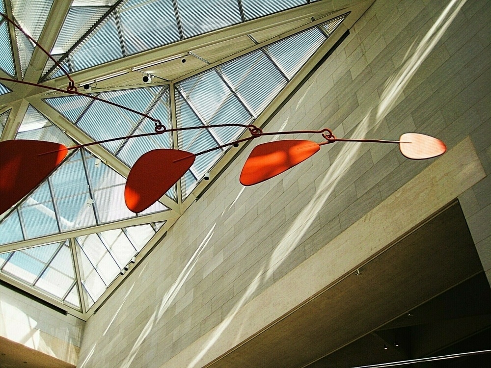 Large Calder mobile against skylights. 