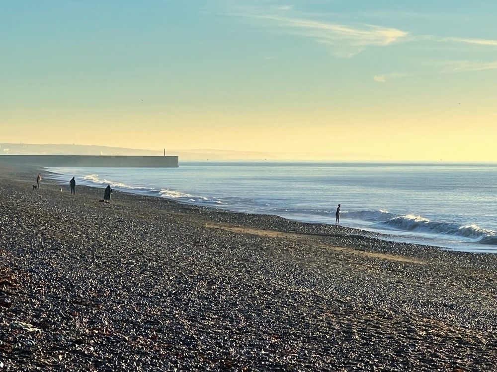Sea swimmers off Shoreham Beach on a freezing winter morning. 