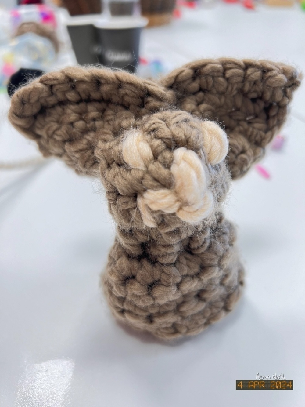 A brown crochet bunny 