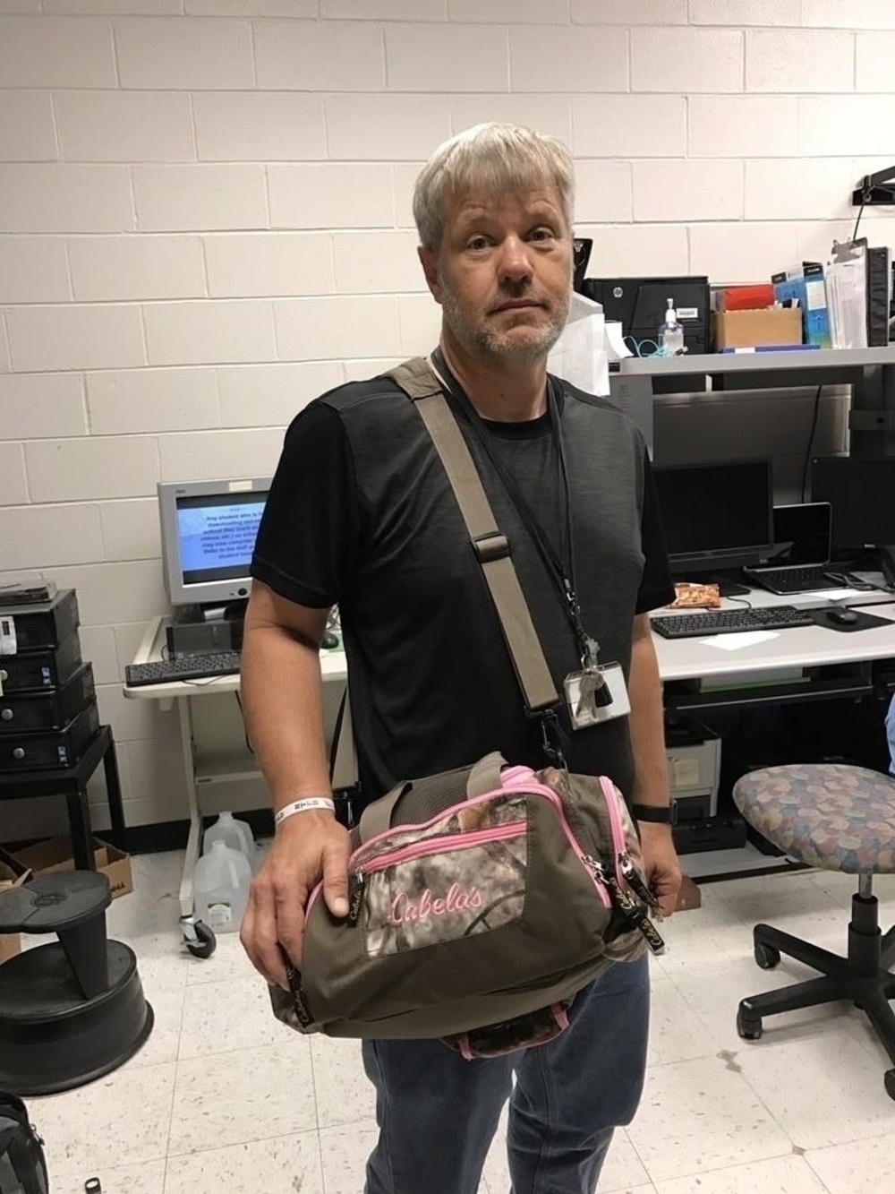 Man sporting pink camo toolbag