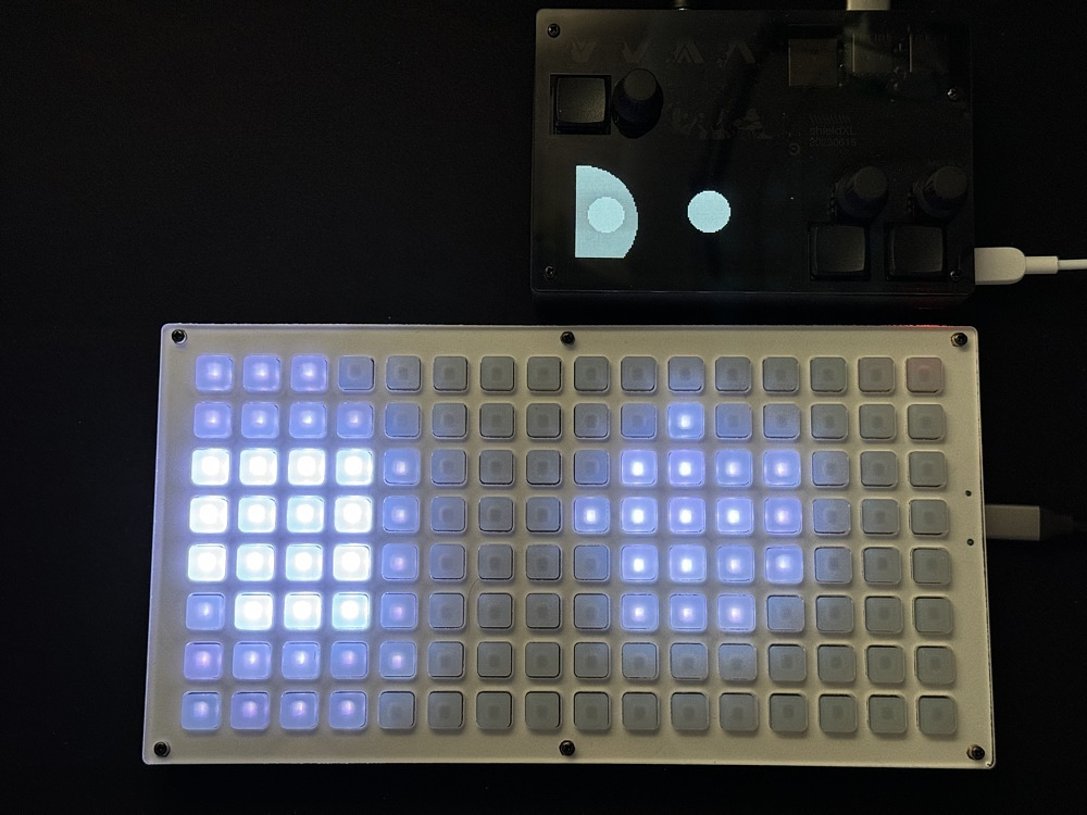 The shieldXL (monome norns shield clone) hooked up to the neotrellis (monome grid clone) and running the Bloom script.