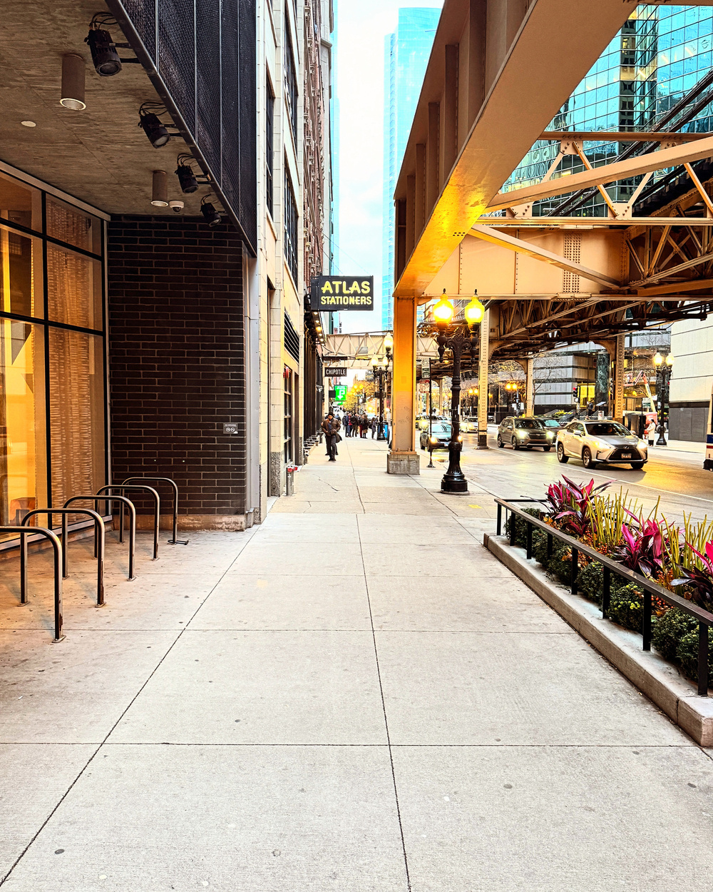 Outside sidewalk picture in front of Atlas Stationers. 