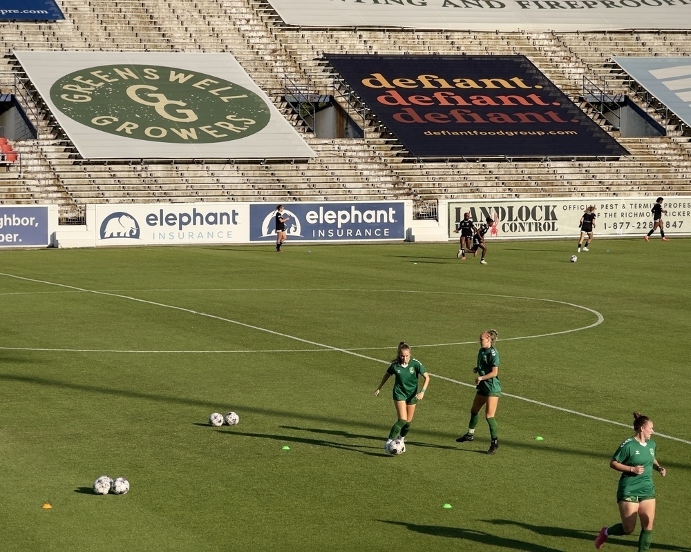 Players for the Richmond Ivy soccer team warm up at City Stadium