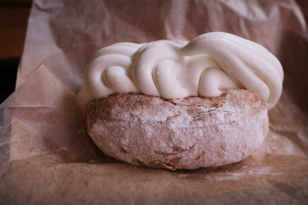 A fried bun filled with soft serve ice cream