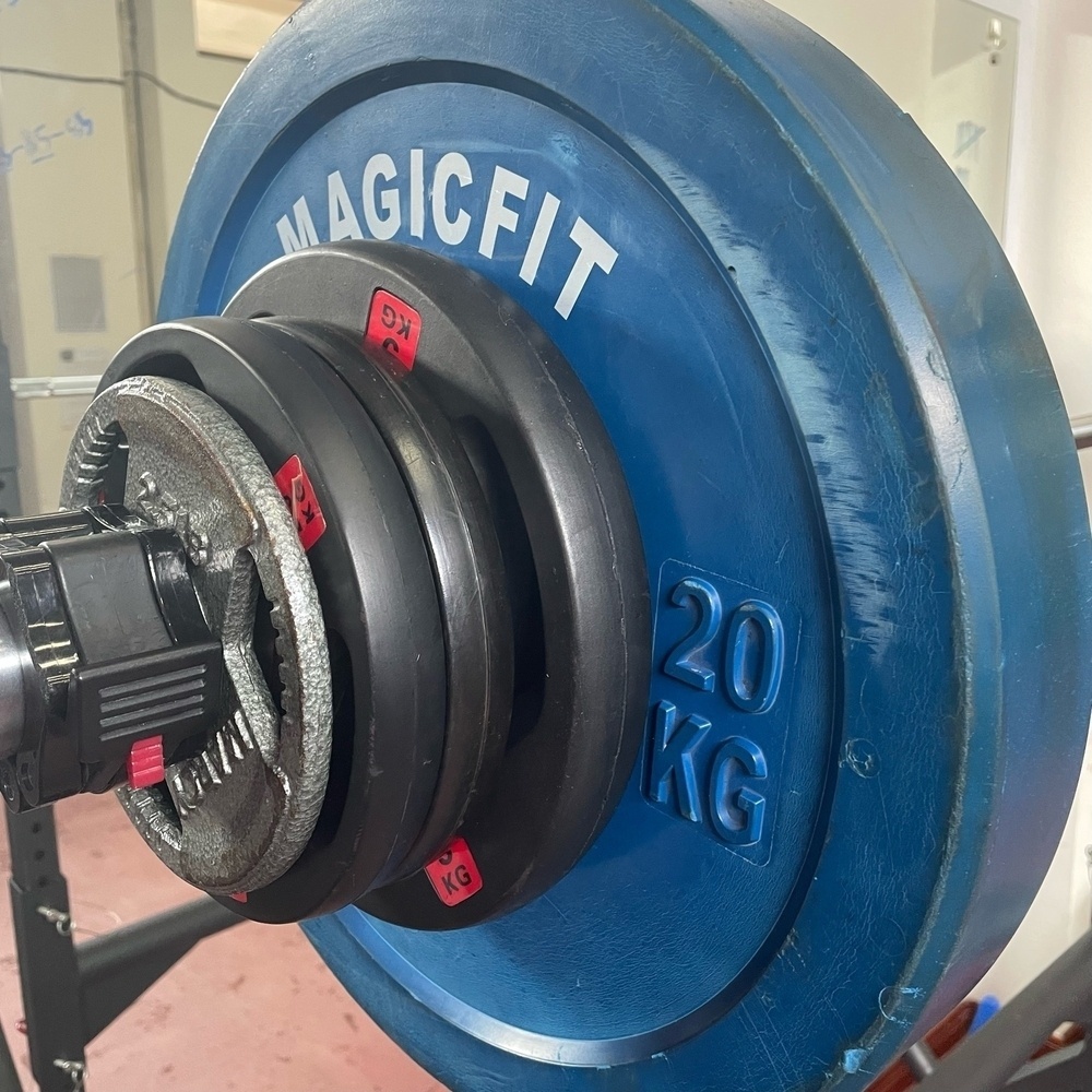 weights on the end of a barbell