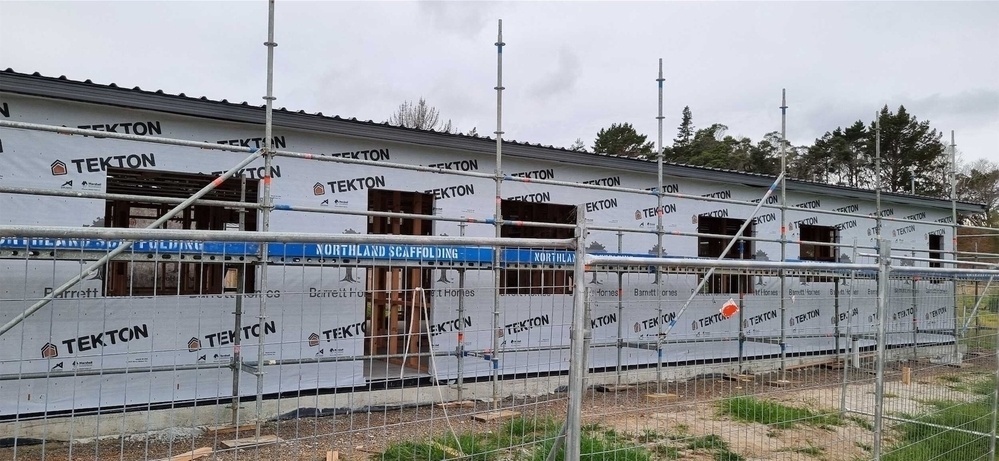 Building with building paper wrap installed. 