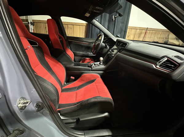 An interior view of the FK8 from the passenger side door.