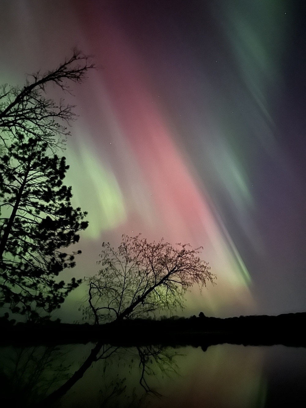 Aurora Borealis over lake near Brainerd, MN