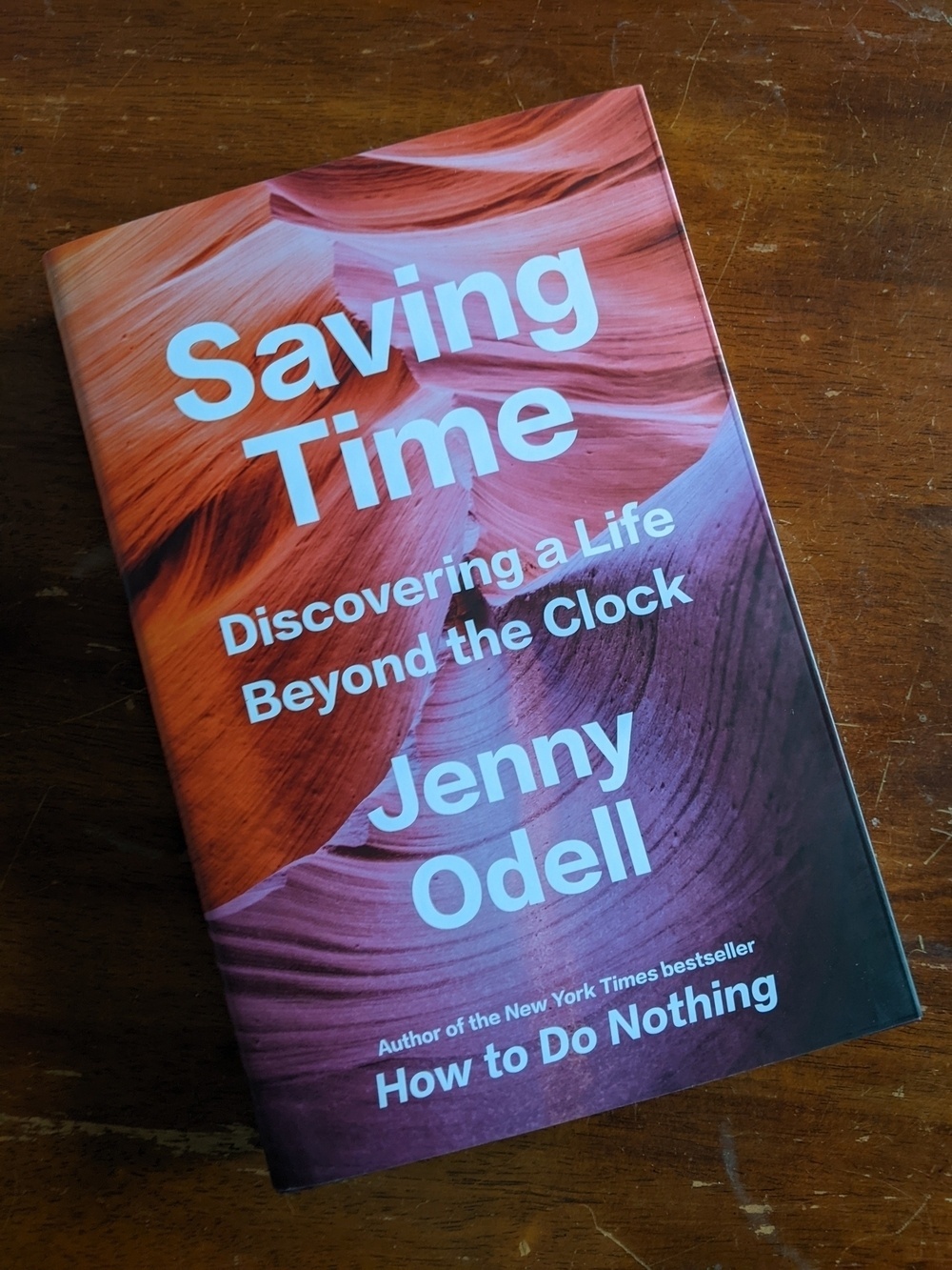 Hardcover of Saving Time on a table 