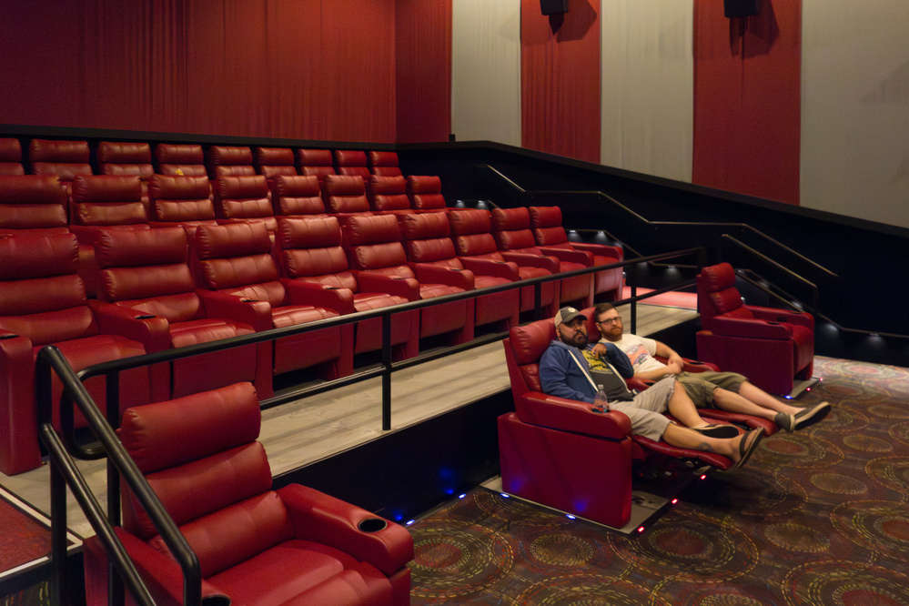 Two men in an empty movie theater - Sony RX100