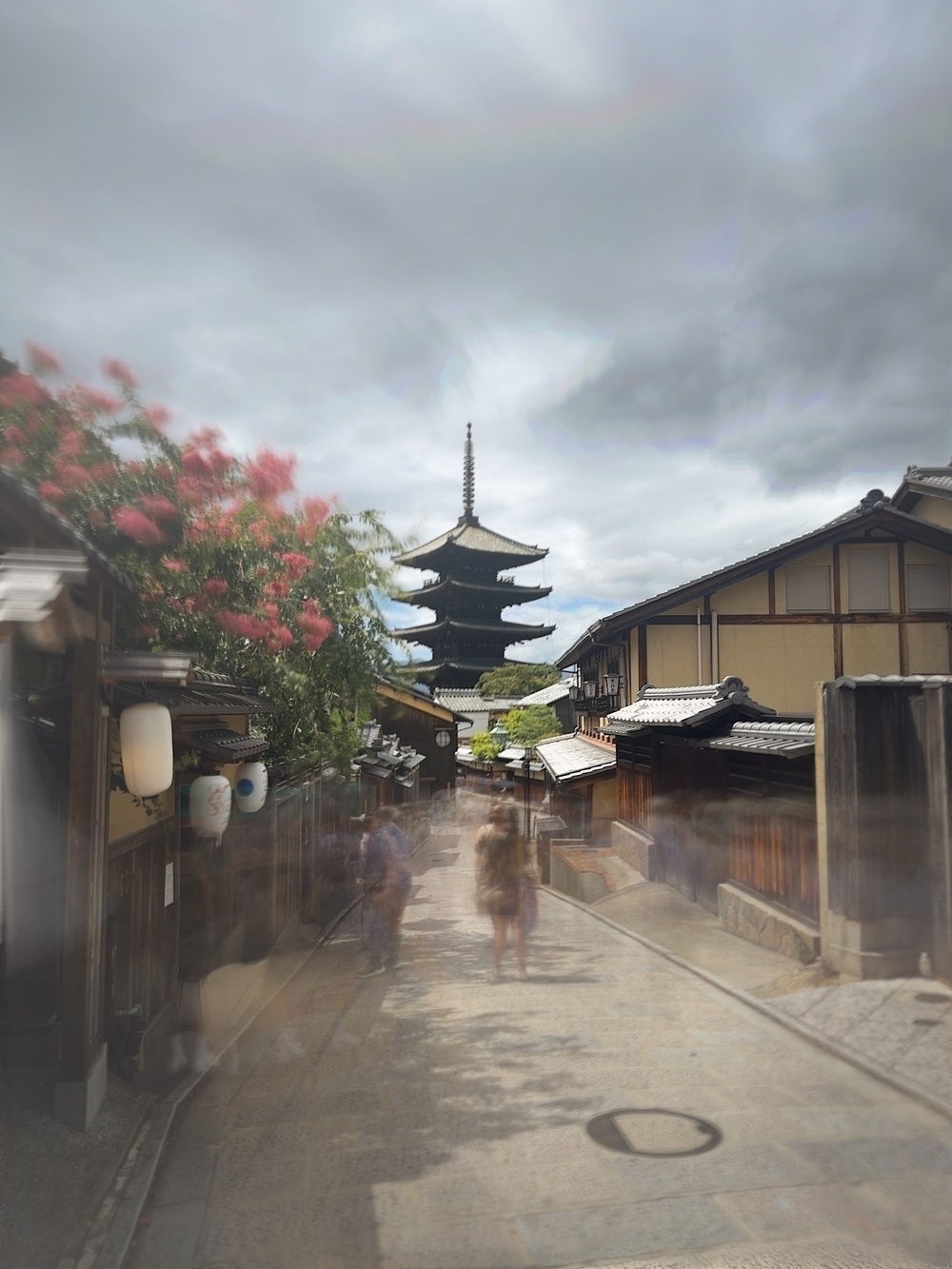 Hōkan-ji Temple in Kyoto, Japan. Summer around midday. A long exposure to blur the clouds of people giving the shot a ghost like quality.