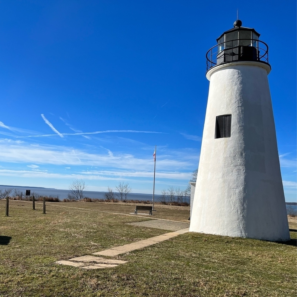 lighthouse with Chesapeake Bay in background on sunny January day