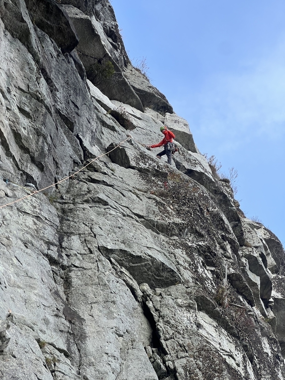 Me, rock climbing and waving at the camera from far above.