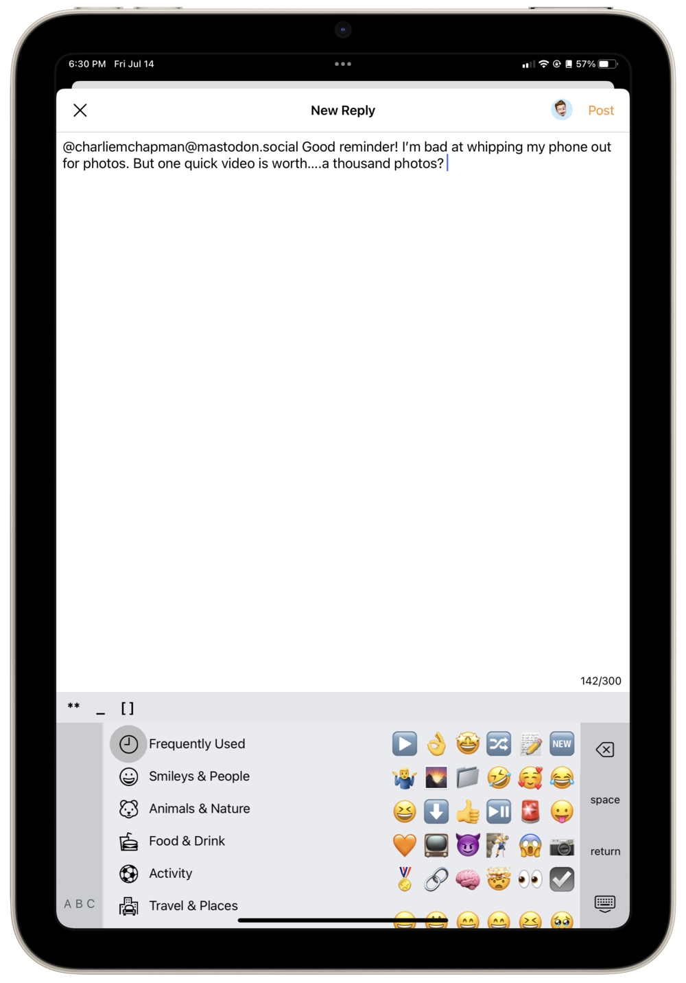 iPad text composition screen with split view keyboard in portrait orientation, with emoji categories on the left and vertically scrolling emoji list on the right.