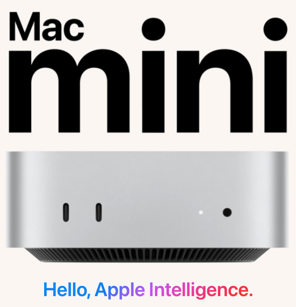 A silver Mac Mini computer is shown from the front with USB-C ports, under large text reading “Mac mini.” Below, colorful text states, “Hello, Apple Intelligence.”