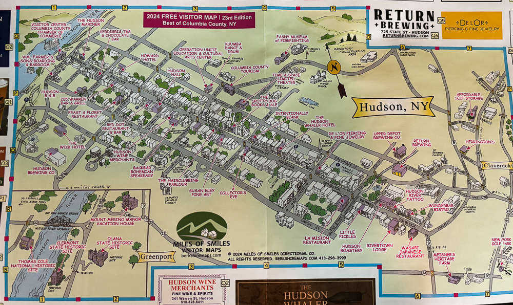 A detailed illustrated map of Hudson, NY, highlighting streets, landmarks, businesses, and tourist attractions.