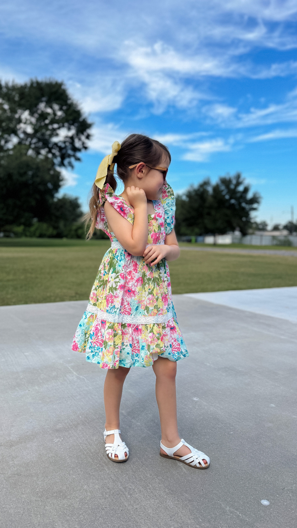 A girl posing in her Sunday best