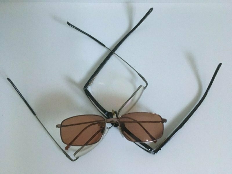 Spectacle? – Three pairs of spectacles interlaced