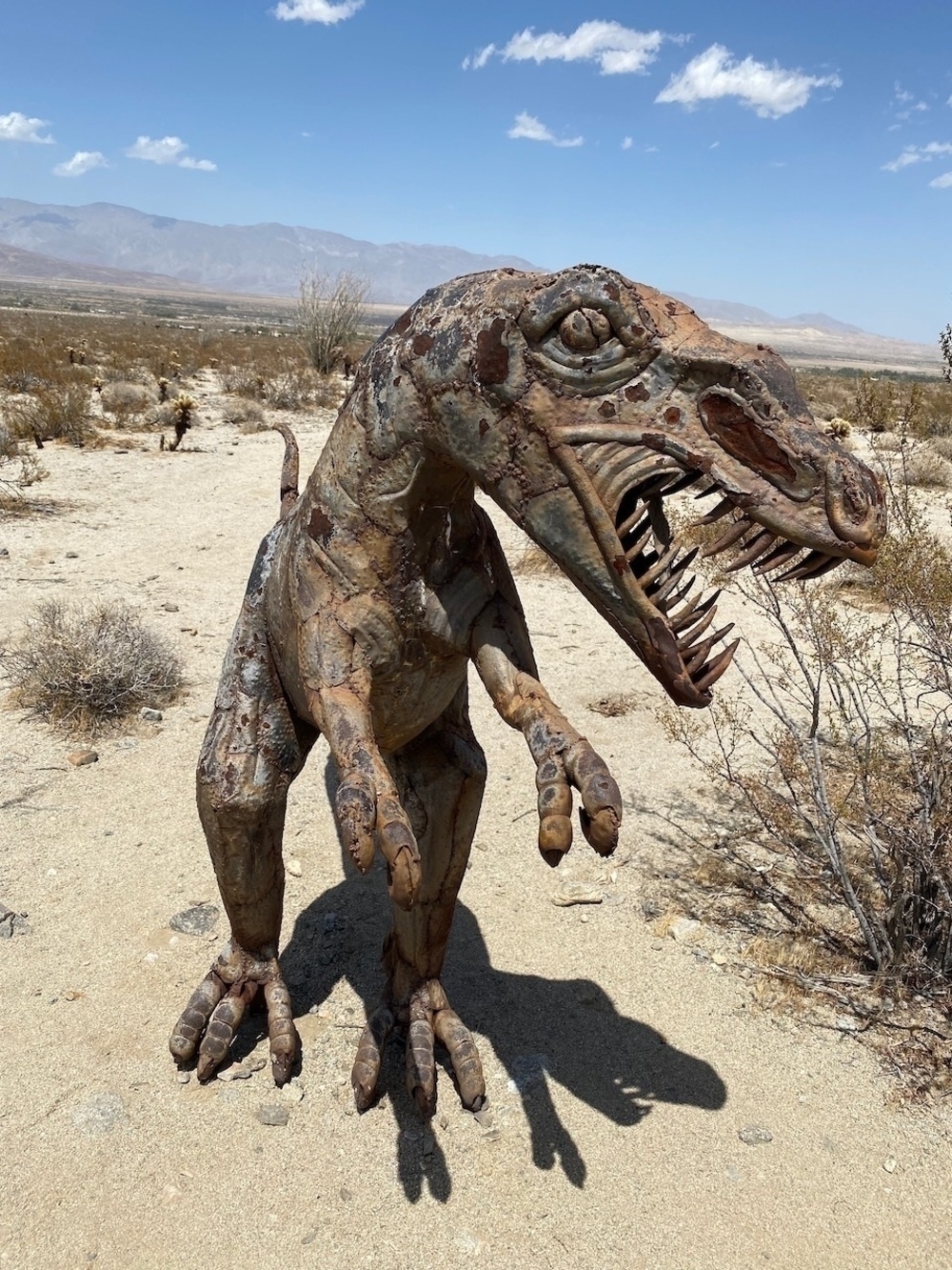 Dinosaur metal sculpture