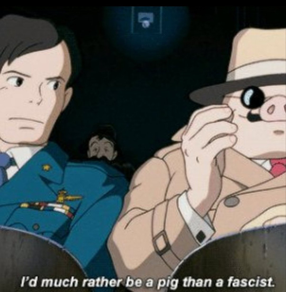 A scene from the animated film “Porco Rosso” featuring two characters: one is a man in a blue military uniform, and the other is an anthropomorphic pig. I’d much rather be a pig than a fascist.