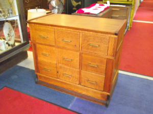 A beautifully restored quartersawn oak filing cabinet in 4 sections with 9 drawers intended for 5x8" index cards.