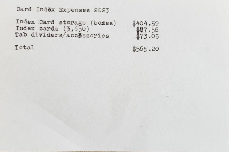 Typed Index card with two column accounting of payments for index card materials