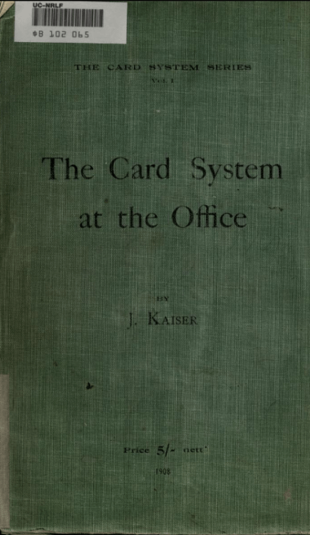 Faded green cover of a book entitled The Card System at the Office by J. Kaiser.