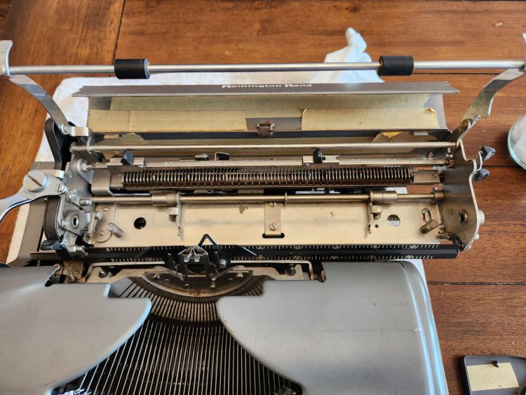 Remington All-New Typewriter opened up with the platen removed.