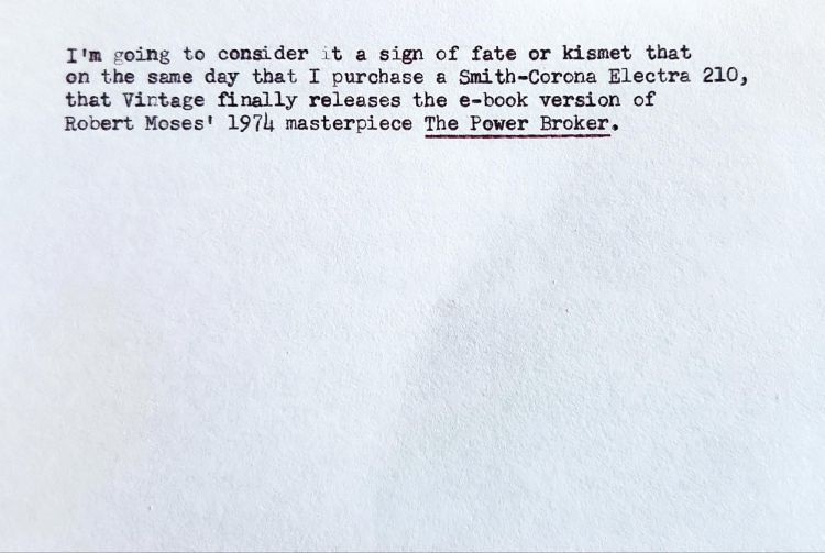 Typed index card reading: I'm going to consider it a sign of fate or kismet that on the same day that I purchase a Smith-Corona Electra 210, that Vintage finally releases the e-book version of Robert Moses' 1974 masterpiece The Power Broker.