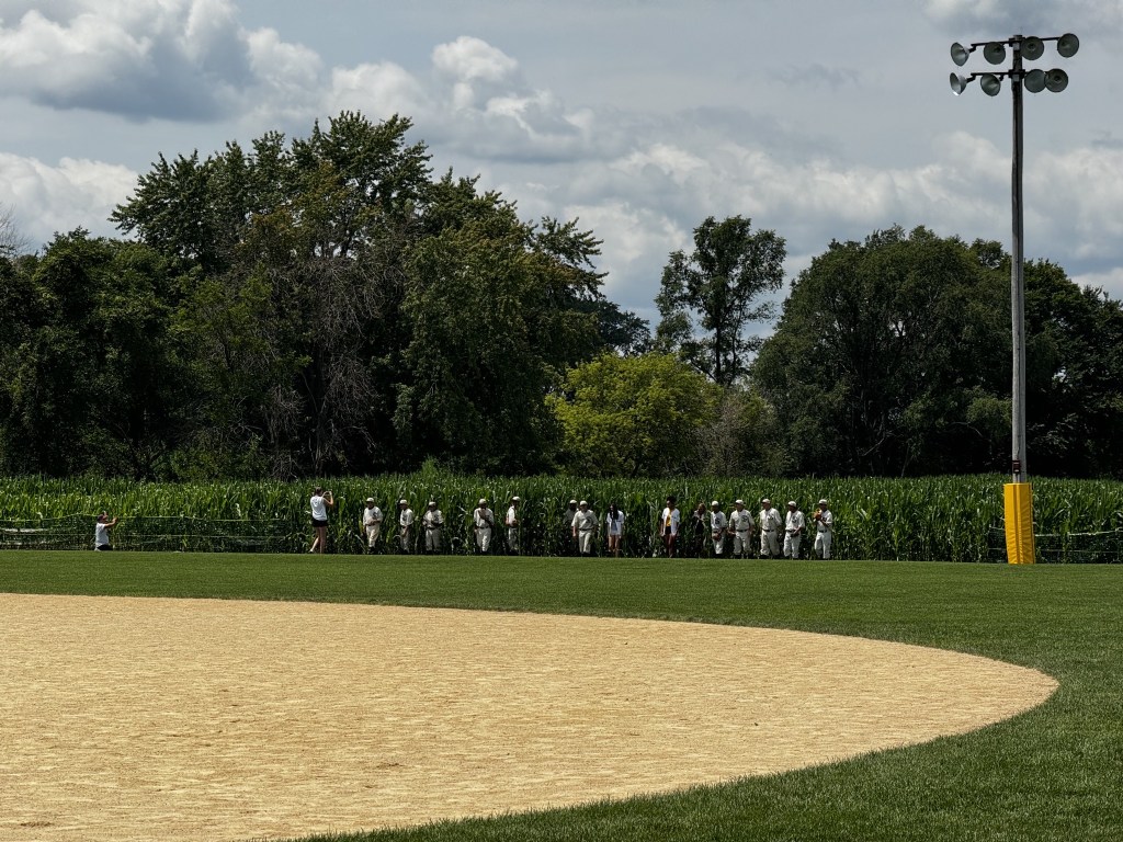 Ghost players emerging from cornfield