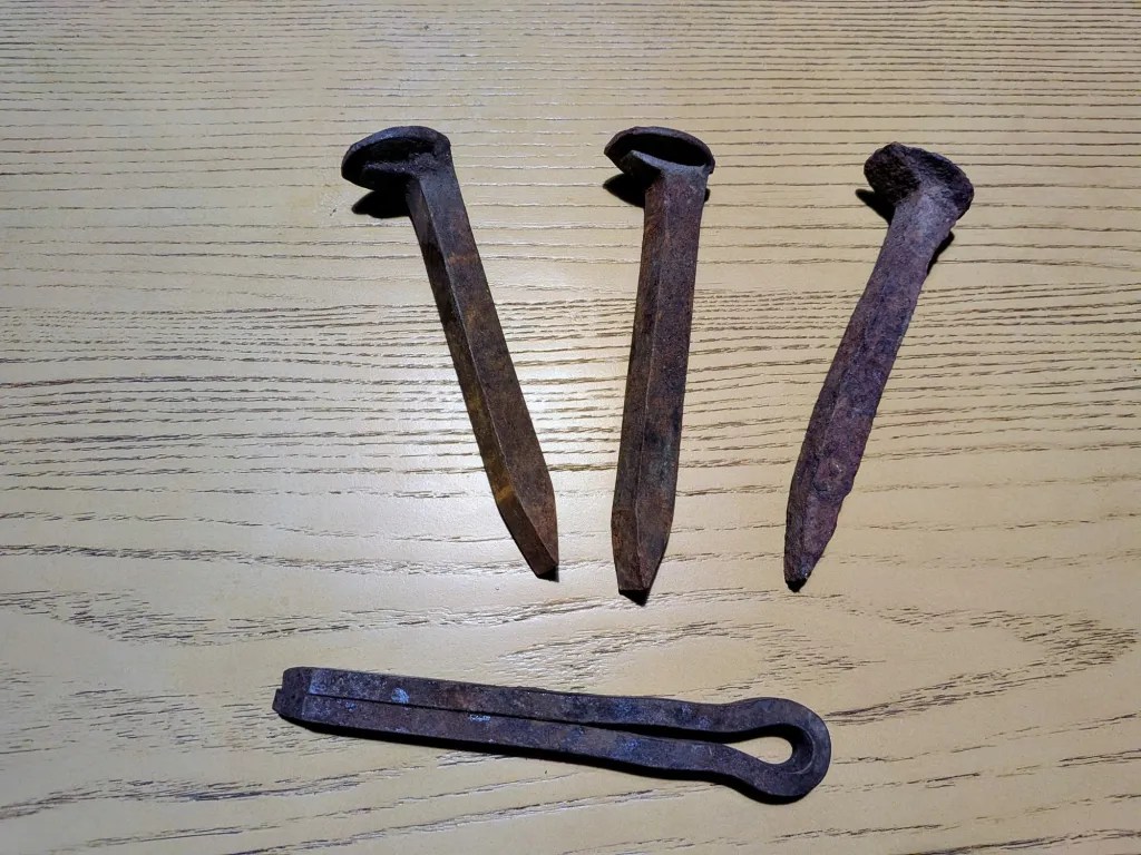 Three railroad ties and cotter pin