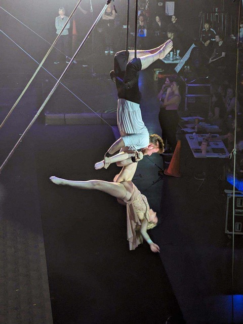 Beatrix and Aiden performing a trick on the Double Trapeze at Circus Juventas in Saint Paul, MN.