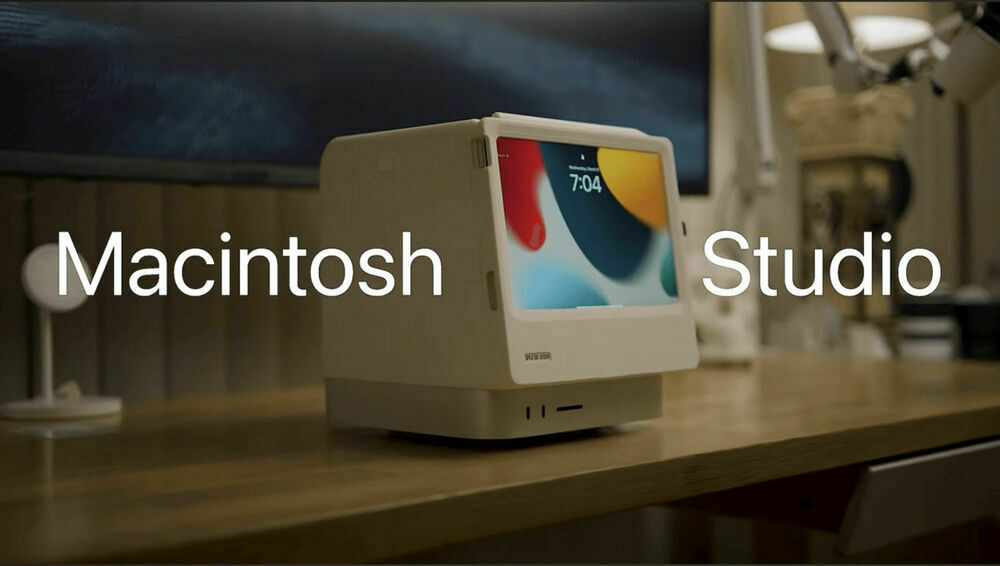 A vintage-style computer on a desk with the word ‘Macintosh’ overlaid on the left and ‘Studio’ on the right.