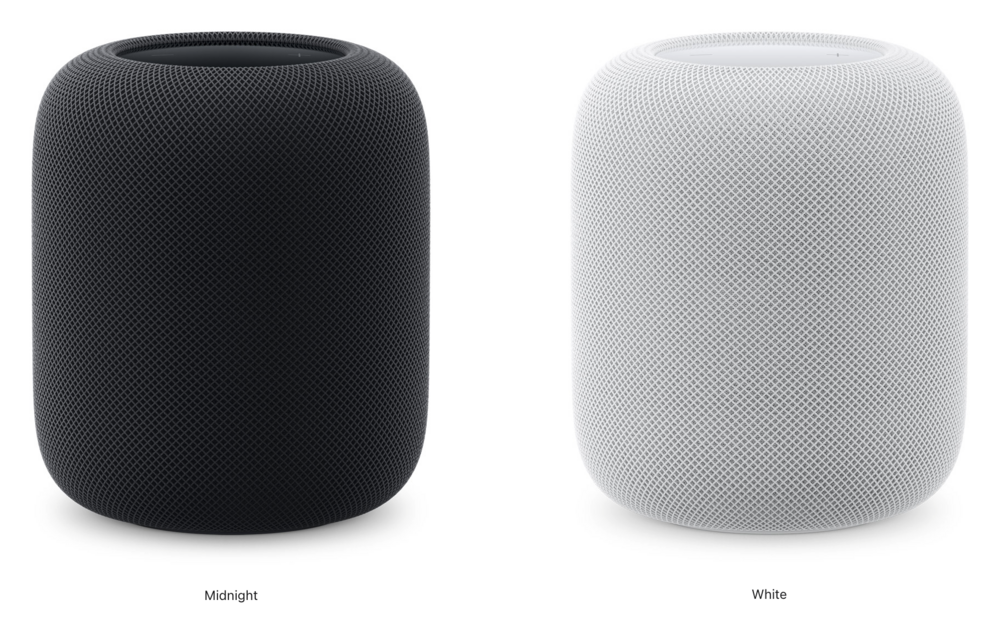 Two cylindrical HomePod speakers displayed: the left one is black with “Midnight” text below, and the right one is white with “White” text below, both in a plain setting.