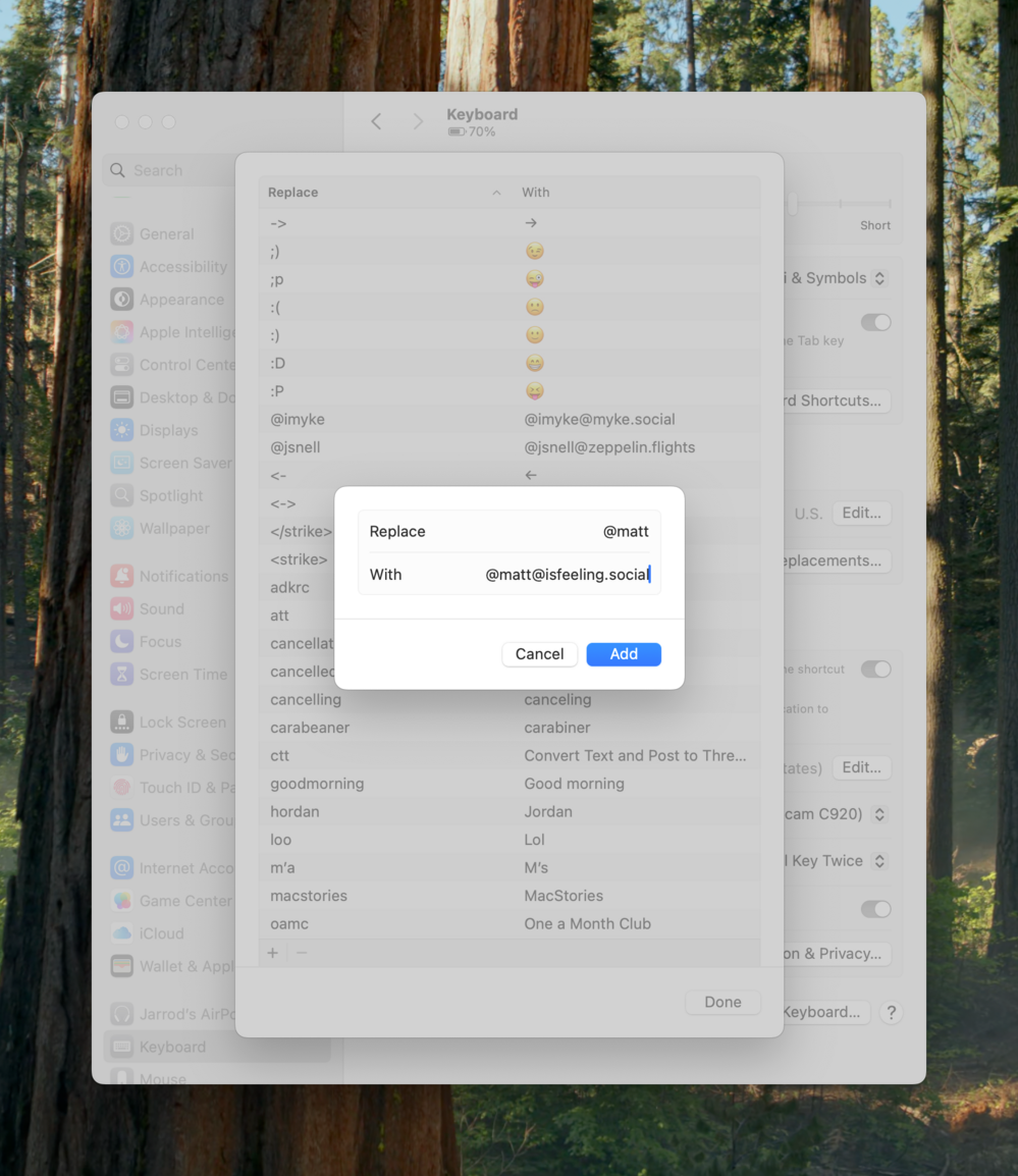 Keyboard settings window displays text replacement list, overlaying a forest background. A smaller pop-up shows replacement entry: “@matt” with “@matt@isfeeling.social”. Options include “Cancel” and “Add”.