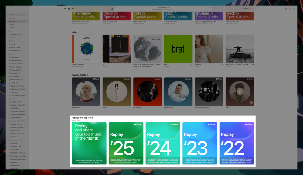 A digital music library interface displays curated playlists and artist sections. Highlights include “Alternative in Spatial Audio,” “Jazz in Spatial Audio,” and “Replay: Your Top Music.” Artists feature Vampire Weekend and Bon Iver.