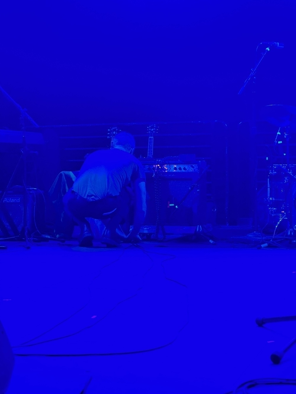 Ted Leo fiddling with his amp