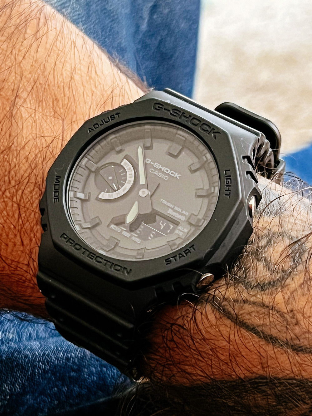 A Casio G-Shock watch. A simple, small, one. 