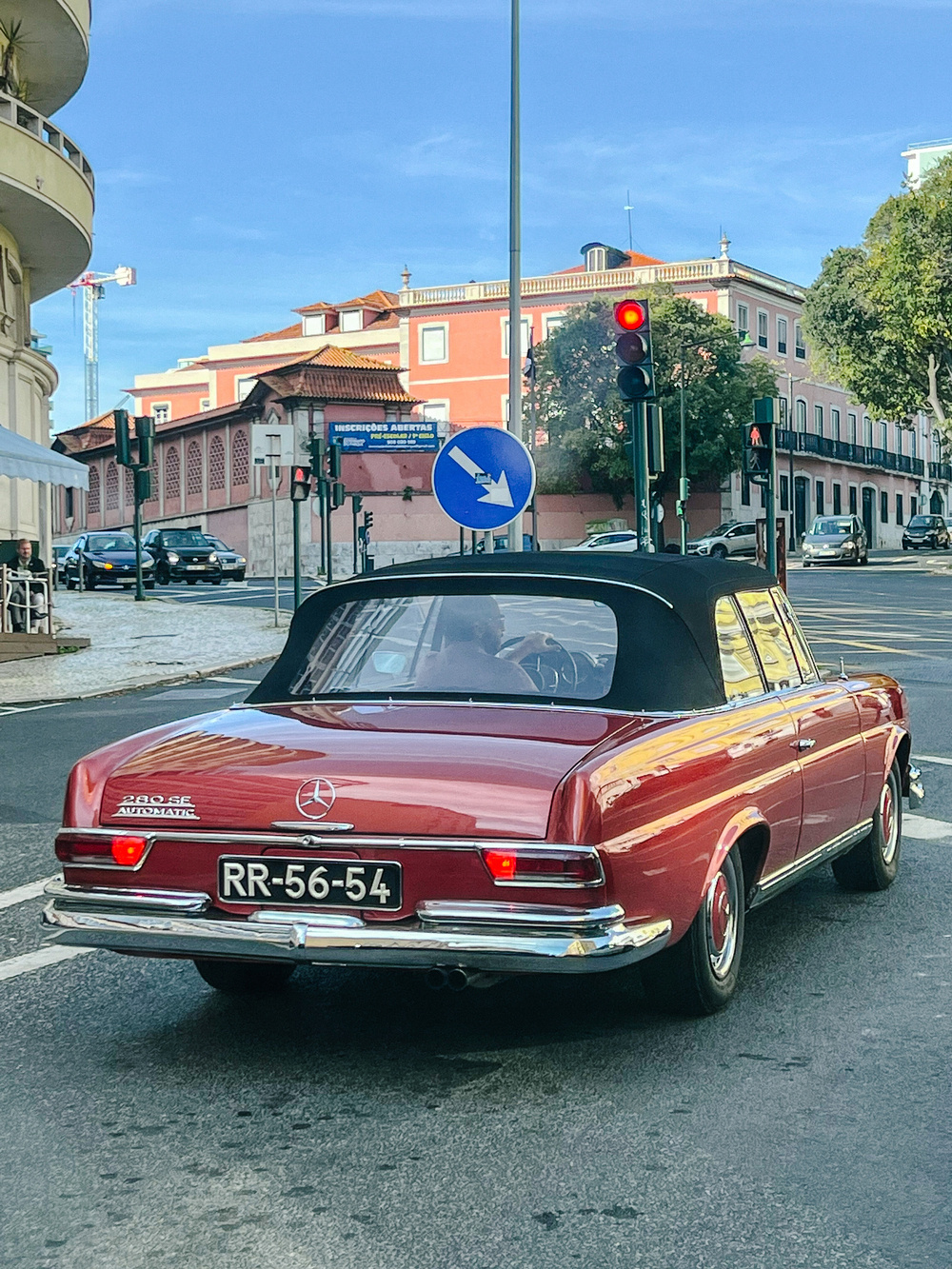 A vintage red Mercedes.