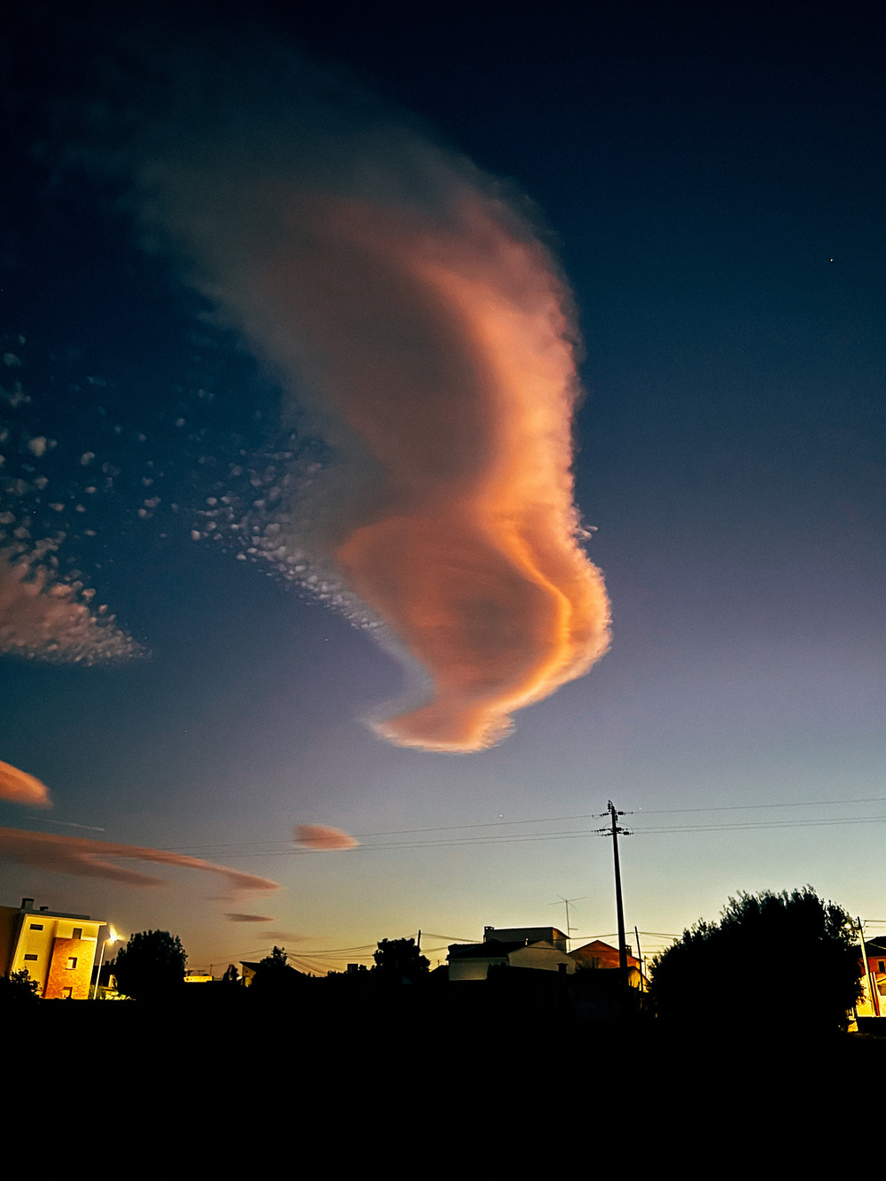 A beautiful cloud in the sky, after sunset. 