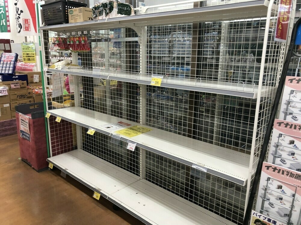 Empty supermarket shelves where the rice should be