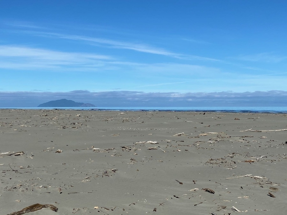 Sand, sea sky and Kāpiti Island.