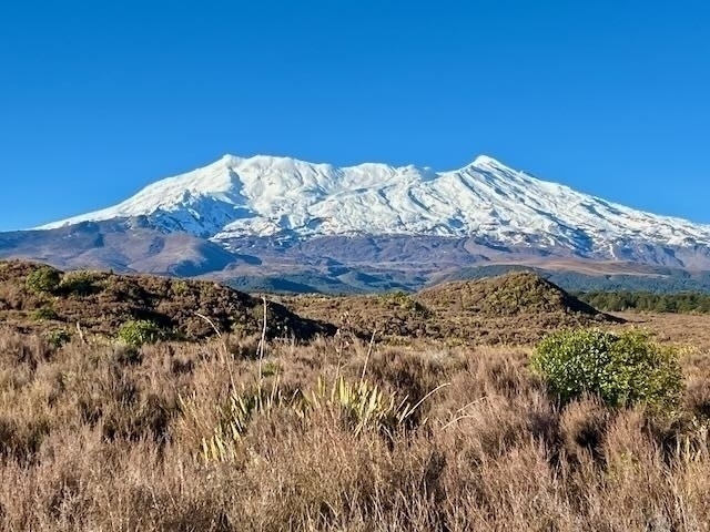 Ruapehu, a broad mountain with a snow covered top. 