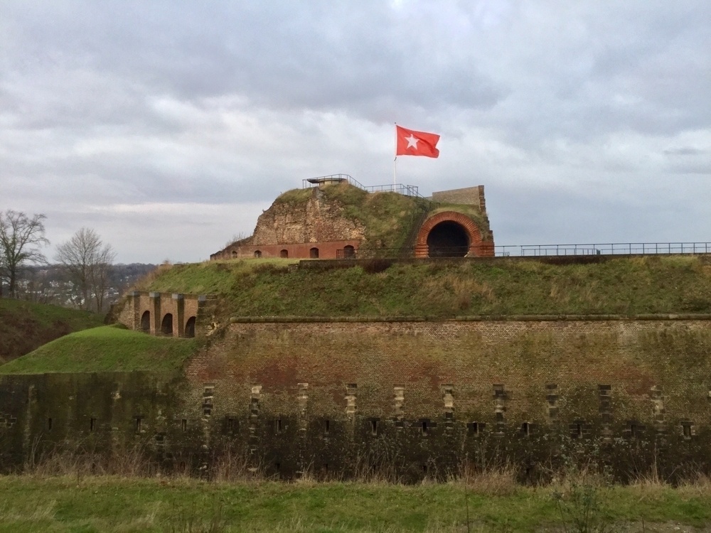 waving flag on an old fortress