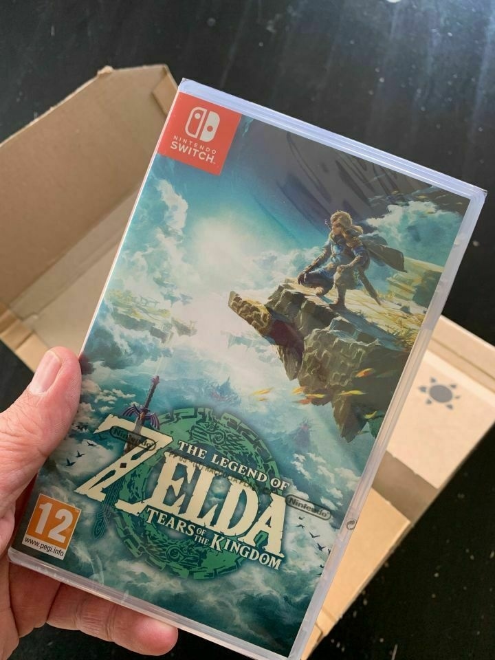 I just received the new game Zelda Tears of the Kingdoms that I hold in my hand