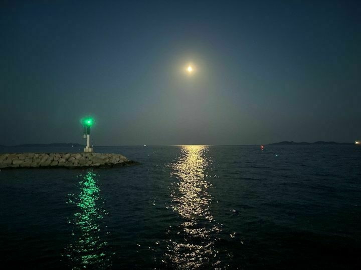 View of the island of Porquerolle from the port of La Londe Les Maures by night