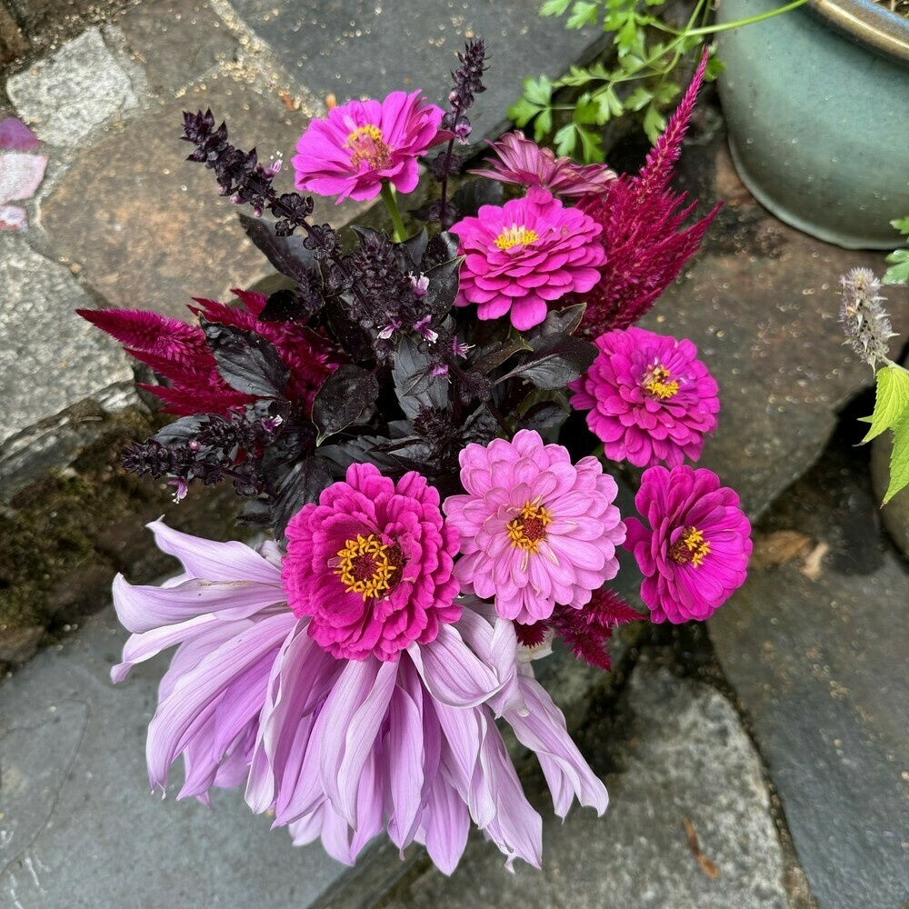 Same vase of new flowers, but from above.