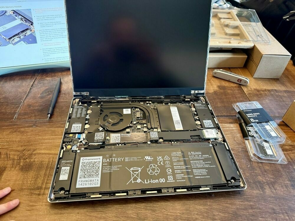 Laptop before keyboard is added with internal components exposed
